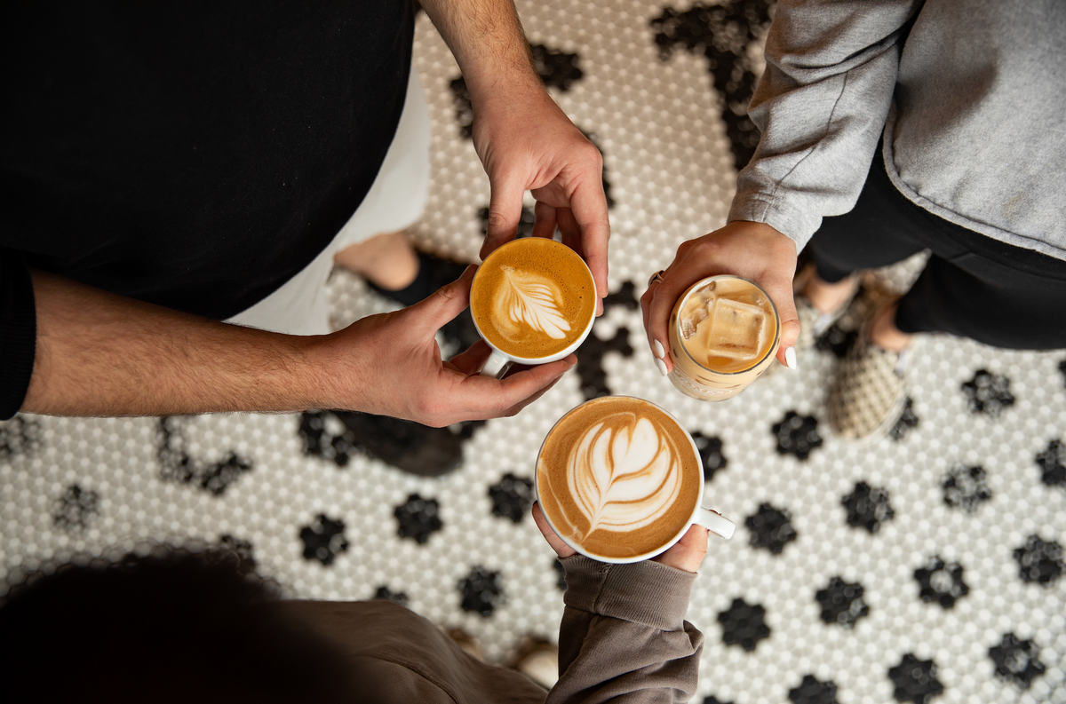 Friends sharing handcrafted Foster coffee drinks